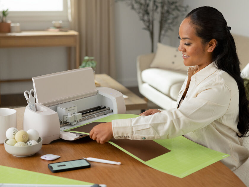 Woman's hands weeding vinyl 